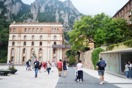 Montserrat, Catalonia - June 23, 2013: Monestir de Montserrat. Montserrat Benedictine monastery, spiritual symbol and religious center of Catalonia and the pilgrimage center of Catholics from around the world.のeditorial素材