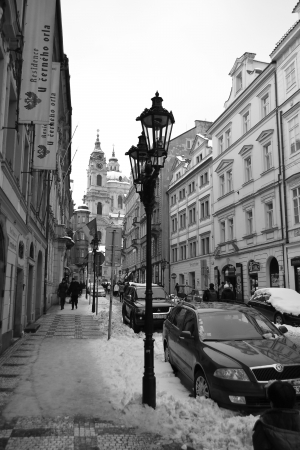 Prague, Czech Republic - February 24, 2013: Street in center of Prague at winter. Black and white.のeditorial素材