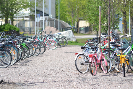 Lappeenranta, Finland - May 21, 2014: Parked bicycles on street of Lappeenranta.のeditorial素材