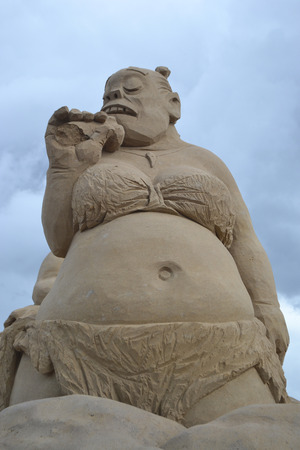 LAPPEENRANTA, FINLAND - AUGUST 21, 2014: Portrait of a female troll. Sand Sculpture Festival in Lappeenranta.のeditorial素材