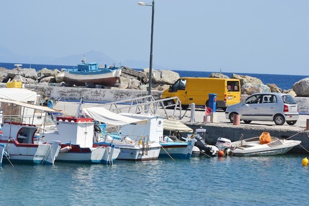 KEFALOS, GREEK - SEPTEMBER 5, 2014: Fishing boats in port of Kefalos on a Greek island of Kos.のeditorial素材