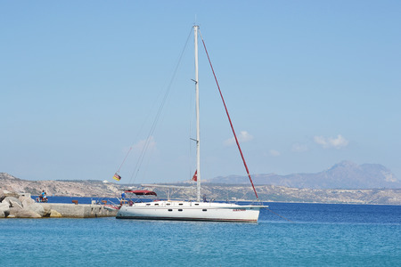 KEFALOS, GREEK - SEPTEMBER 5, 2014: Sailing yacht at the pier, Aegean Sea, Greece.のeditorial素材