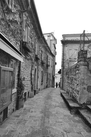 Medieval narrow street in San Marino republic, Italy. Black and white.の写真素材