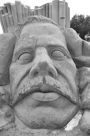 LAPPEENRANTA, FINLAND - AUGUST 21, 2014: Sculpture of man face. Sand Sculpture Festival in Lappeenranta. Black and white.のeditorial素材