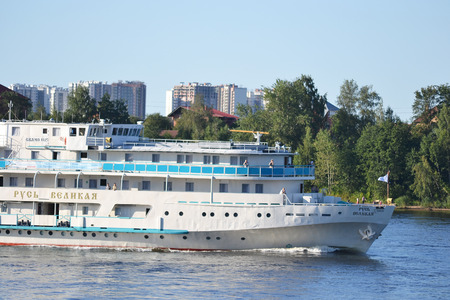 ST.PETERSBURG, RUSSIA - JULY 20, 2014: River cruise ship sailing on the river Neva, outskirts of St. Petersburg.のeditorial素材