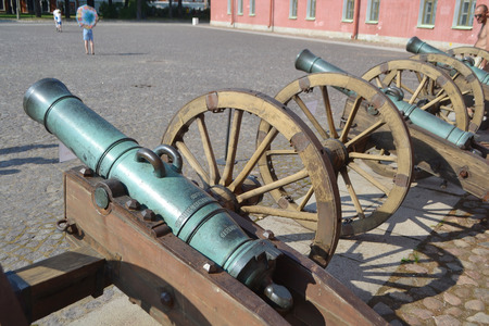 ST.PETERSBURG, RUSSIA - JULY 29, 2014: Old artillery cannons near wall Peter and Paul Fortress, St.Petersburg., Russia.のeditorial素材