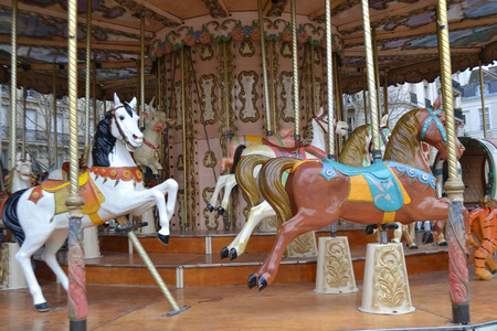 PARIS, FRANCE - JANUARY 7, 2013: French old carousel with horses.のeditorial素材