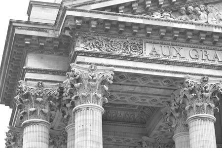 Sculptural detail of Pantheon in Latin Quarter in Paris, France. Black and white.