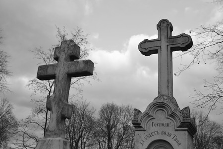 ST.PETERSBURG, RUSSIA - OCTOBER 21, 2013: Old graves at Nikolsky cemetery of Alexander Nevsky Lavra. Black and white.のeditorial素材
