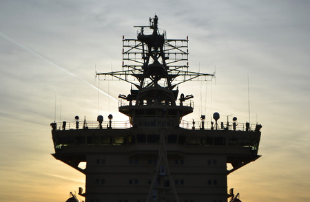 Icebreaker silhouette on sunset background, St.Petersburg, Russia.の写真素材