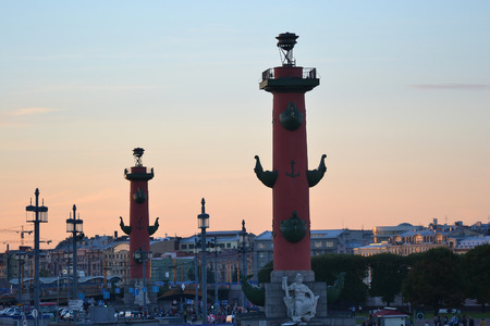 ST.PETERSBURG, RUSSIA - SEPTEMBER 7, 2013: Arrow Vasilevsky Island and Rostral Columns at sunset.