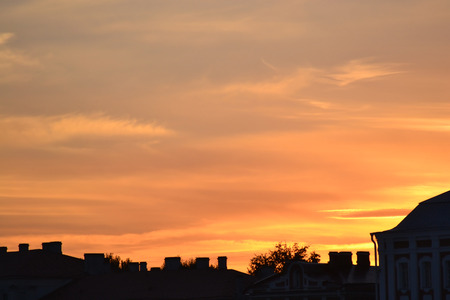 Sunset over the roofs of the town, St.Petersburg, Russia.の写真素材