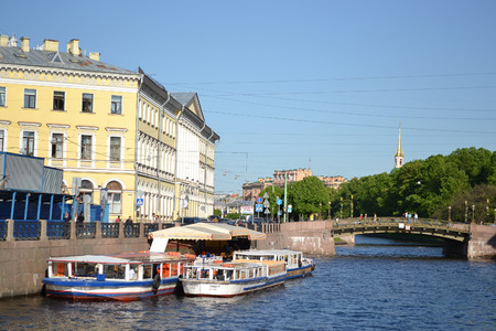 ST.PETERSBURG, RUSSIA - 25 MAY, 2012: Pleasure boats on the canal in the center of St. Petersburg.のeditorial素材
