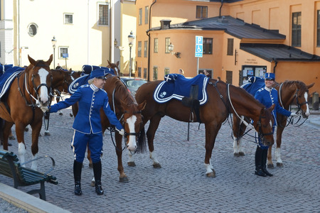 STOCKHOLM, SWEDEN - APRIL 19, 2015: Sweden Royal guard on street of Stockholm.のeditorial素材