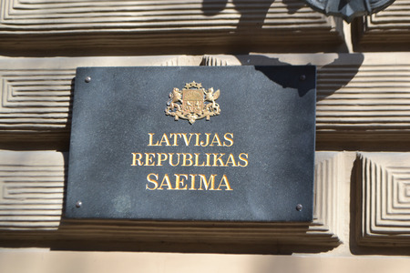 RIGA, LATVIA - APRIL 18, 2015: Nameplate with the inscription: Latvian Saeima Republican. Latvian Parliament.のeditorial素材