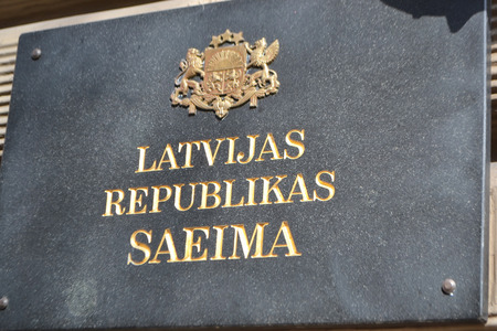 RIGA, LATVIA - APRIL 18, 2015: Nameplate with the inscription: Latvian Saeima Republican. Latvian Parliament.のeditorial素材