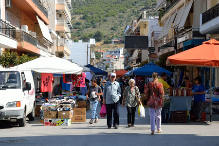 LOUTRAKI, GREECE - 30 MAY, 2015: Temporary food market on the street of the city of Loutraki. Loutraki - resort city, which is well known in Greece because of its mineral springs.のeditorial素材