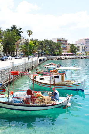 LOUTRAKI, GREECE - 31 MAY, 2015: Fishing boats in the port of Loutraki. Loutraki - resort city, which is well known in Greece because of its mineral springs.のeditorial素材