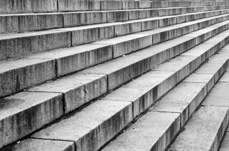 Stairway with granite stone steps in perspective, close up. Black and white.の写真素材