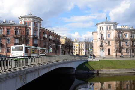 ST.PETERSBURG, RUSSIA - APRIL 16, 2016: View of the bridge across Komsomol channel and Kolpino town at spring sunny day on the outskirts of St. Petersburg, Russia.のeditorial素材