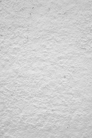Rough white wall plaster, it can be used as background.の写真素材