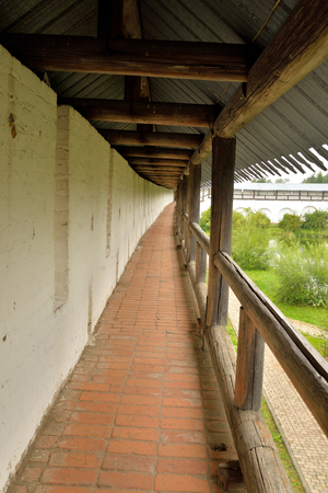 Fortress wall of of Saviour Priluki Monastery by cloud day near Vologda, Russia.のeditorial素材