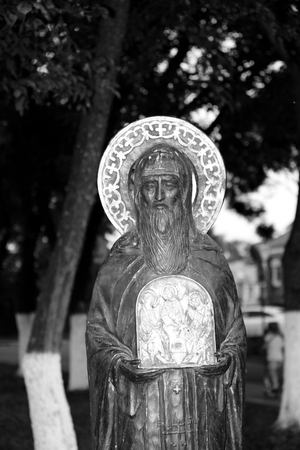 VOLOGDA, RUSSIA - 11 AUGUST 2016: Statue of a Christian saint on street in the central part of Vologda. Black and white.のeditorial素材