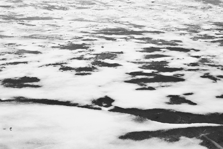 Ice and snow, it can be used as background. Black and white.の写真素材