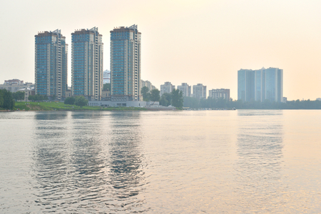 View of Neva river and microdistrict Ribatskoe on the outskirts of St. Petersburg at sunset, Russia.のeditorial素材