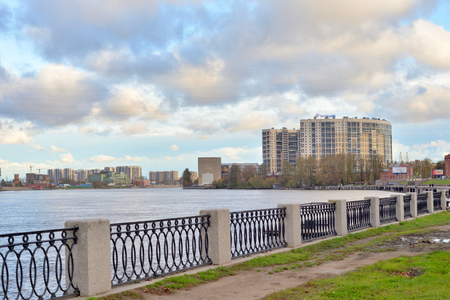 Embankment of the Obukhov defense of Neva River at cloud autumn day, outskirts of Saint Petersburg, Russia.の写真素材