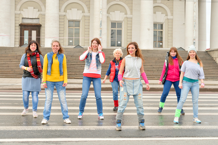 ST.PETERSBURG, RUSSIA - 9 APRIL 2017: Group of people dances on city street in the center of St. Petersburg.のeditorial素材