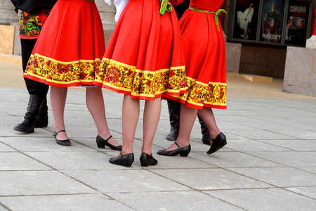 ST.PETERSBURG, RUSSIA - 9 APRIL 2017: Group of people in national costumes for dancing Russian dances on city street.のeditorial素材