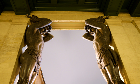 Building of New Hermitage with statues of Atlanteans in center of St.Petersburg at night, Russia.のeditorial素材