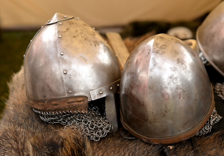 Reconstruction of two medieval knight helmets closeup.