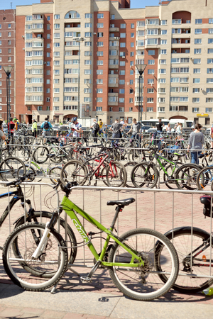 ST.PETERSBURG, RUSSIA - 27 MAY 2018: Parked bicycles on city street at sunny spring day.のeditorial素材
