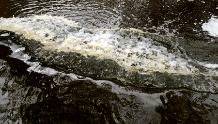 Small waterfall on Sablinka River in Leningrad Region, Russia.の写真素材