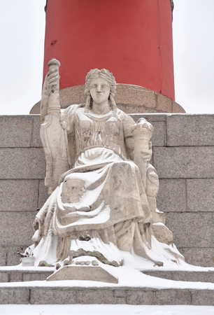 Statue of allegory of the Volga river at the base of the Rostral Column in St.Petersburg, Russia.の写真素材