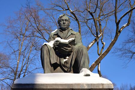 ST.PETERSBURG, RUSSIA - 6 MARCH 2019: Monument to Ivan Krylov in the Summer Garden at sunny winter...