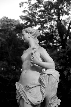 ST.PETERSBURG, RUSSIA - 1 JUNE 2019: Statue of goddess Pomona in Summer Garden in St.Petersburg, Russia. Roman goddess of wood fruits and of plenty, the wife of Vertumnus. Black and white.のeditorial素材