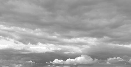 Dark cloud sky, may be used as background. Black and white.