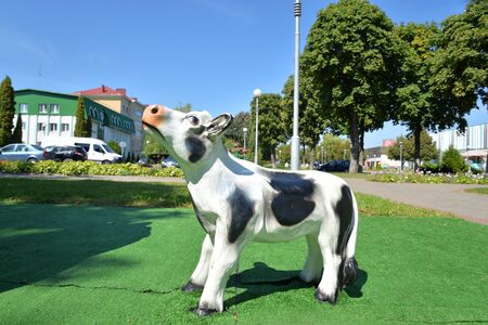 STOLIN, BELARUS - 21 AUGUST 2019: Statue of a calf in the city square at sunny summer day.のeditorial素材