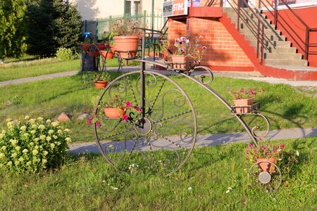 STOLIN, BELARUS - 23 AUGUST 2019: Decorative street decoration in the form of a retro bicycle.のeditorial素材