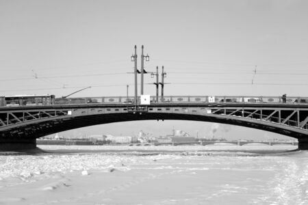 Bridge over the Neva river at winter in St.Petersburg, Russia. Black and white.の写真素材