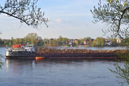 Cargo ship on the Neva river on the outskirts of St. Petersburg, Russia.の写真素材