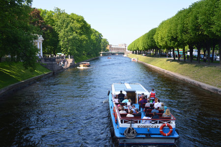 ST. PETERSBURG, RUSSIA - June 11, 2022: Pleasure ships on Moika River in center of St. Petersburg.のeditorial素材