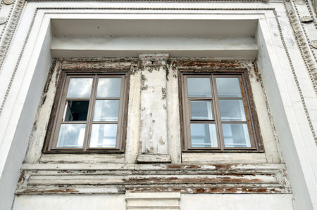 Antique wooden window in poor condition.の写真素材