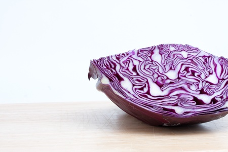 Cabbage at the kitchen isolated on whiteの写真素材