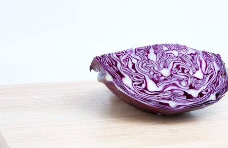 Cabbage at the kitchen isolated on whiteの写真素材