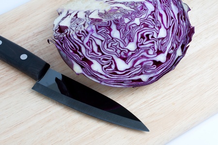 Cabbage and knife at the kitchenの写真素材