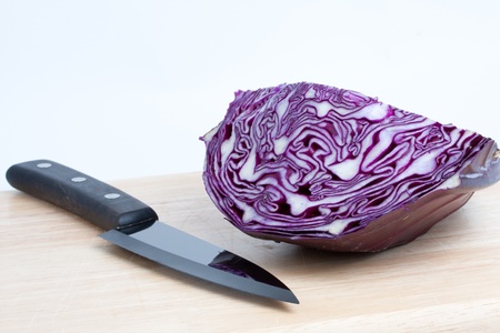 Cabbage and knife at the kitchenの写真素材